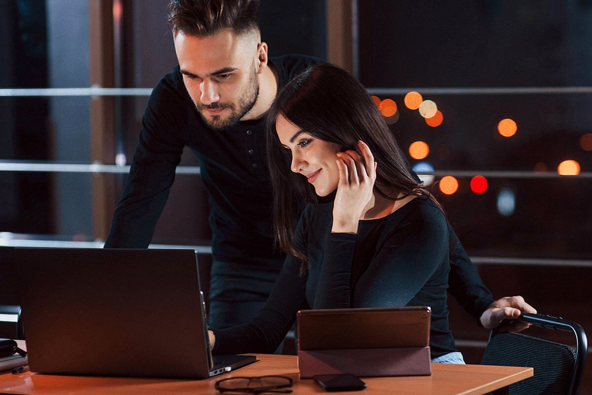 Man and woman at the computer