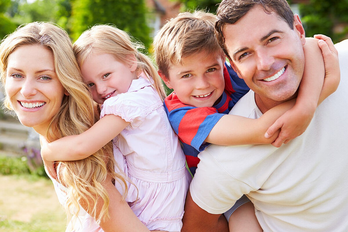 Happy family and two joyful children