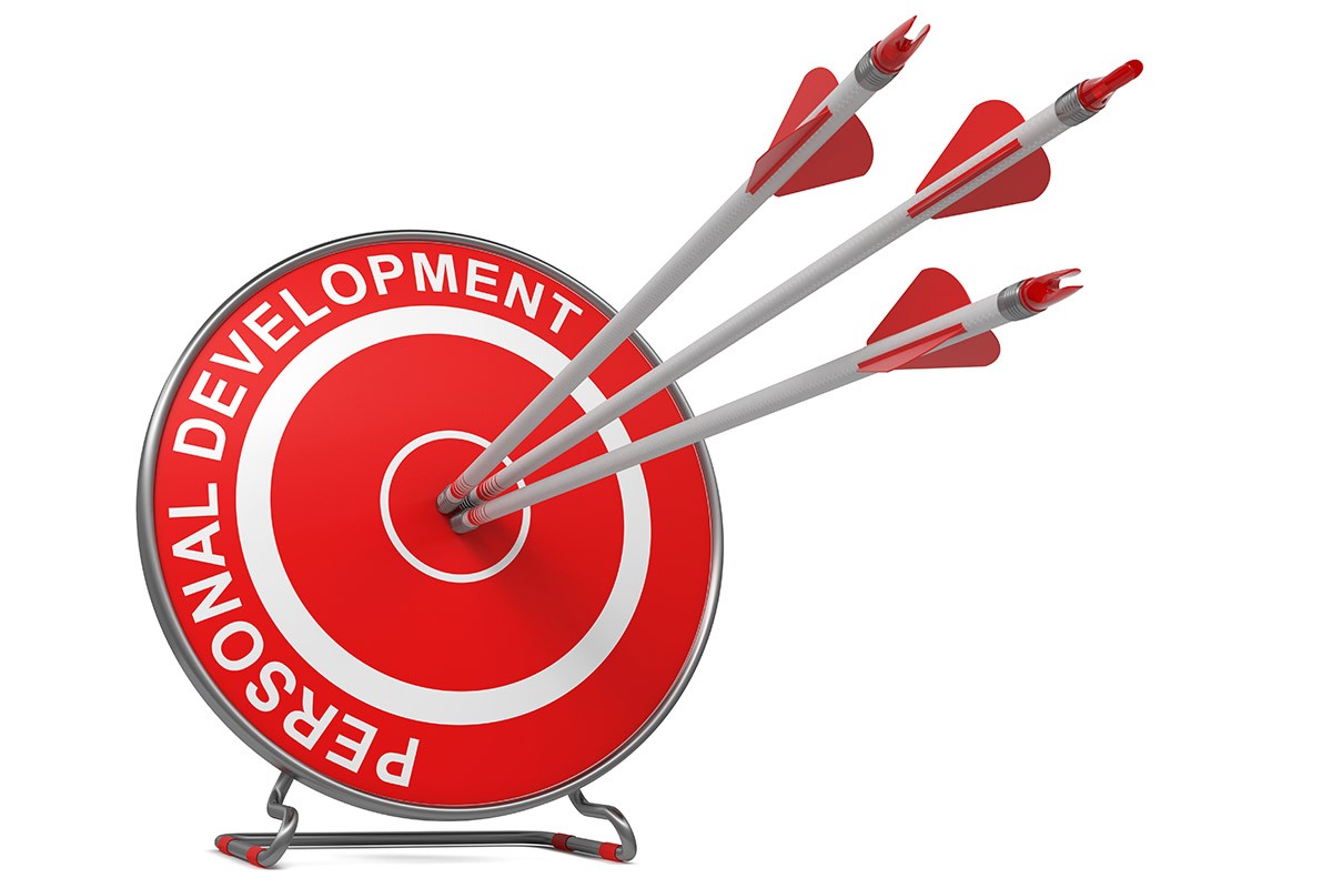 Arrows at the center of personal development goals Arrows at the center of personal development goals