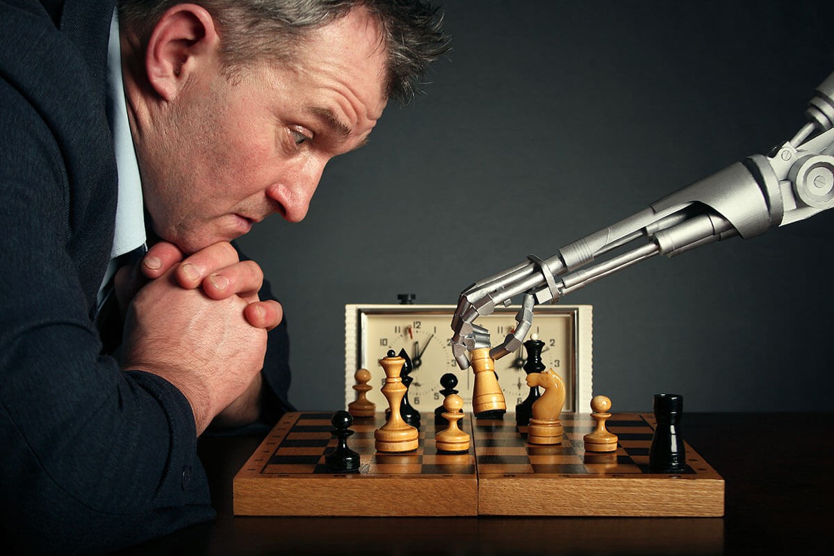 Man and robot play chess