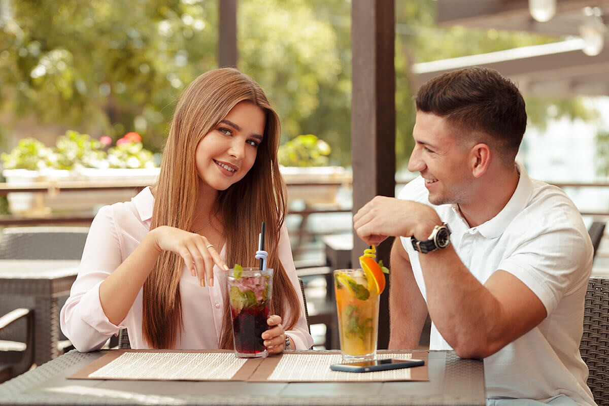 Young man looks at a girl with love
