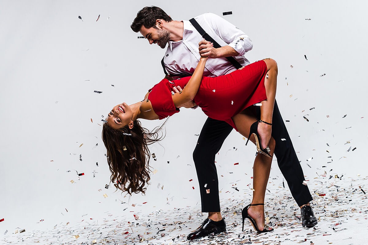 Husband is dancing with his wife