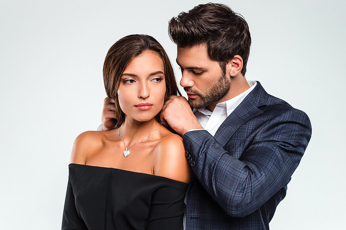 A rich man gives a woman jewellery