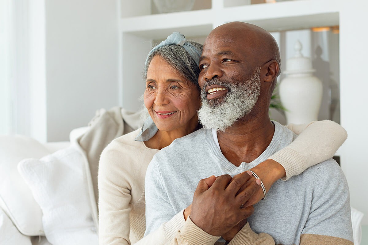 Long-lived family couple cuddling