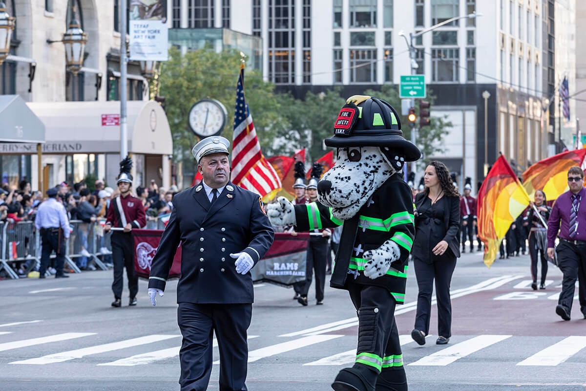New York Fire Department mascot Marching Up Fifth Avenue - 75th annual Columbus Day Parade, Manhattan