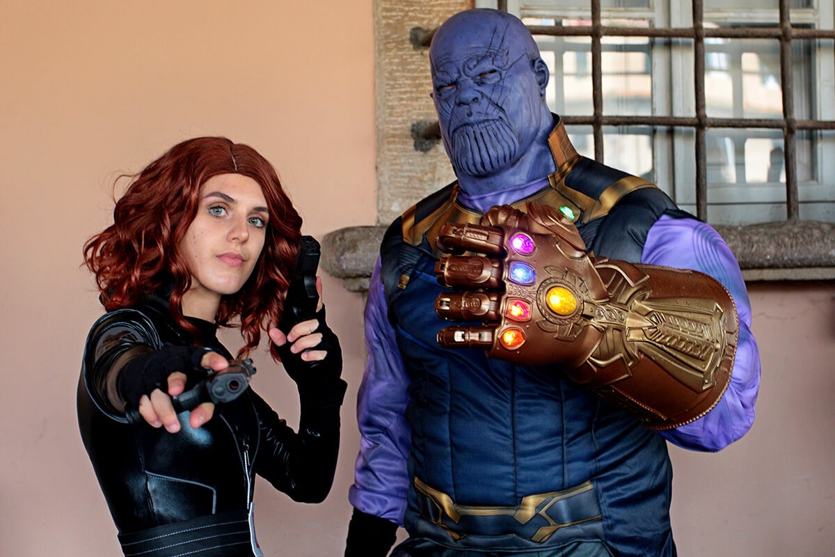 Two cosplay disguised as Black Widow and Thanos of the Avenger superheroes of Marvel - Event Lucca Comics & Games