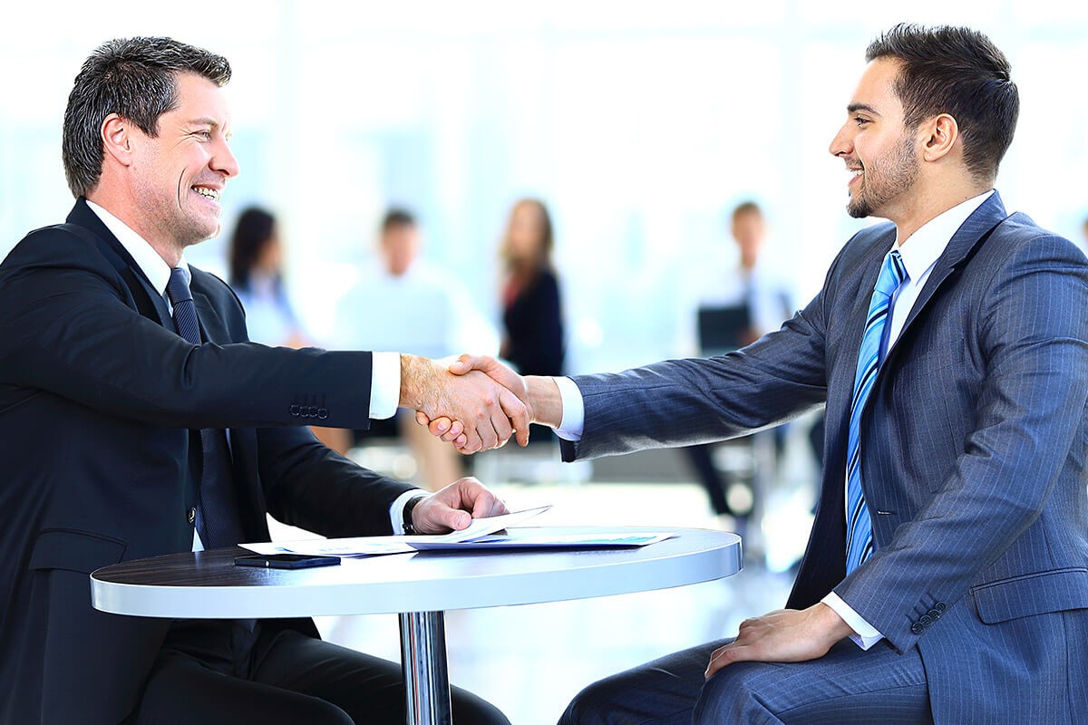 Business people shaking hands