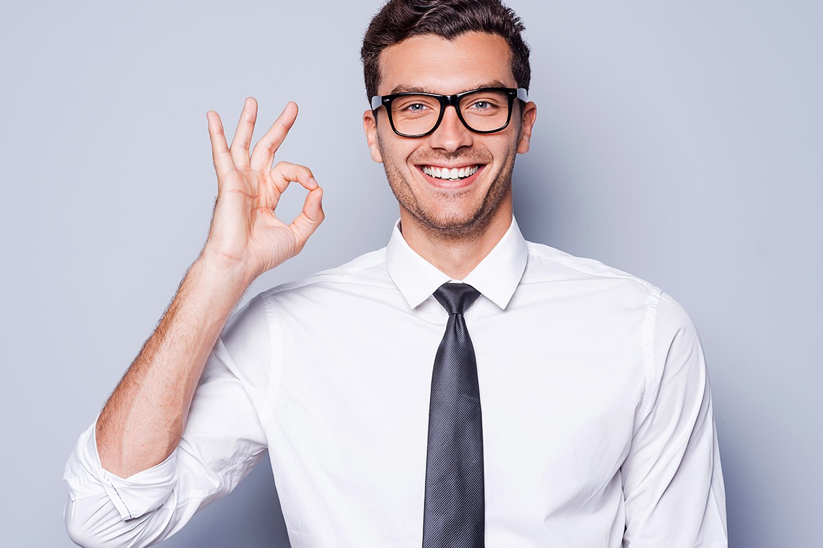 A young man shows that he is doing well with his career
