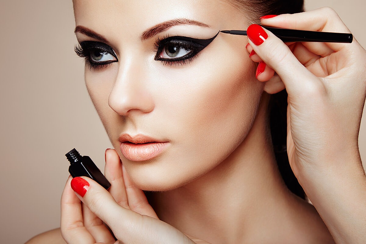Woman makeup applied on eyes