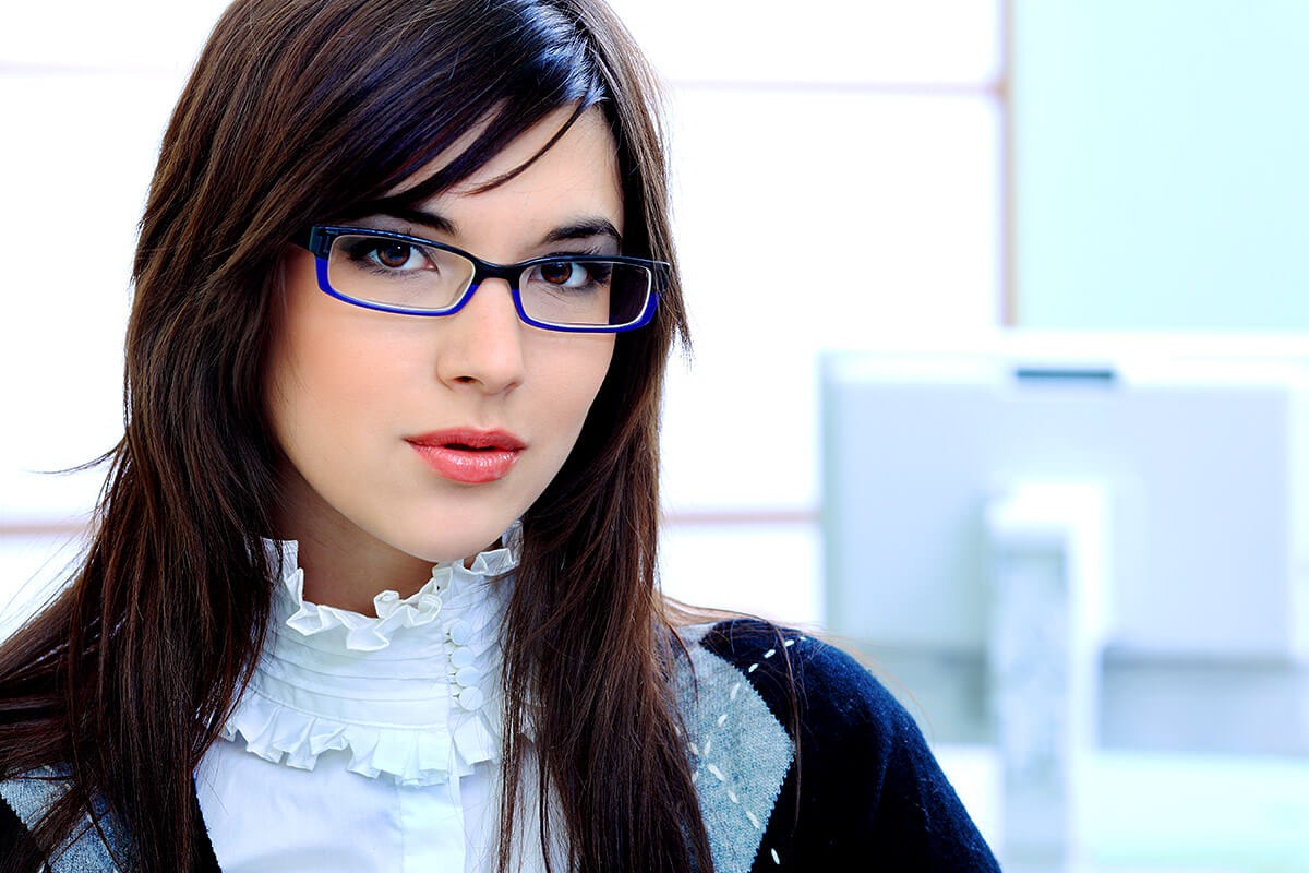 Successful business woman looking attentively