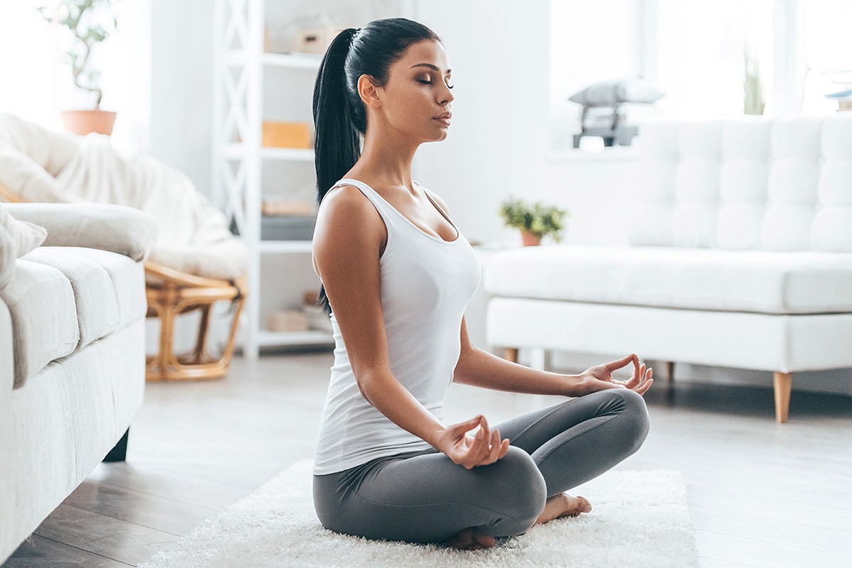 Woman practices yoga for health and youth