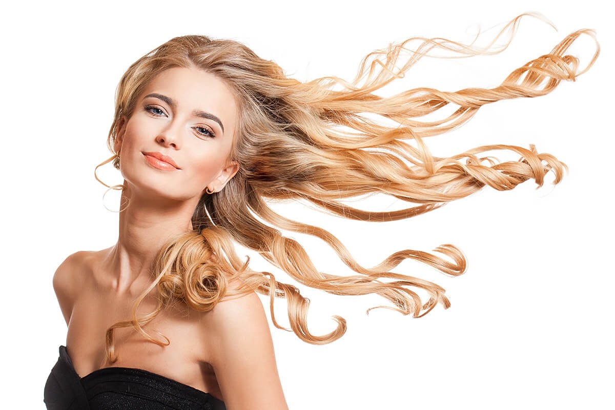 Girl shows long and healthy hair