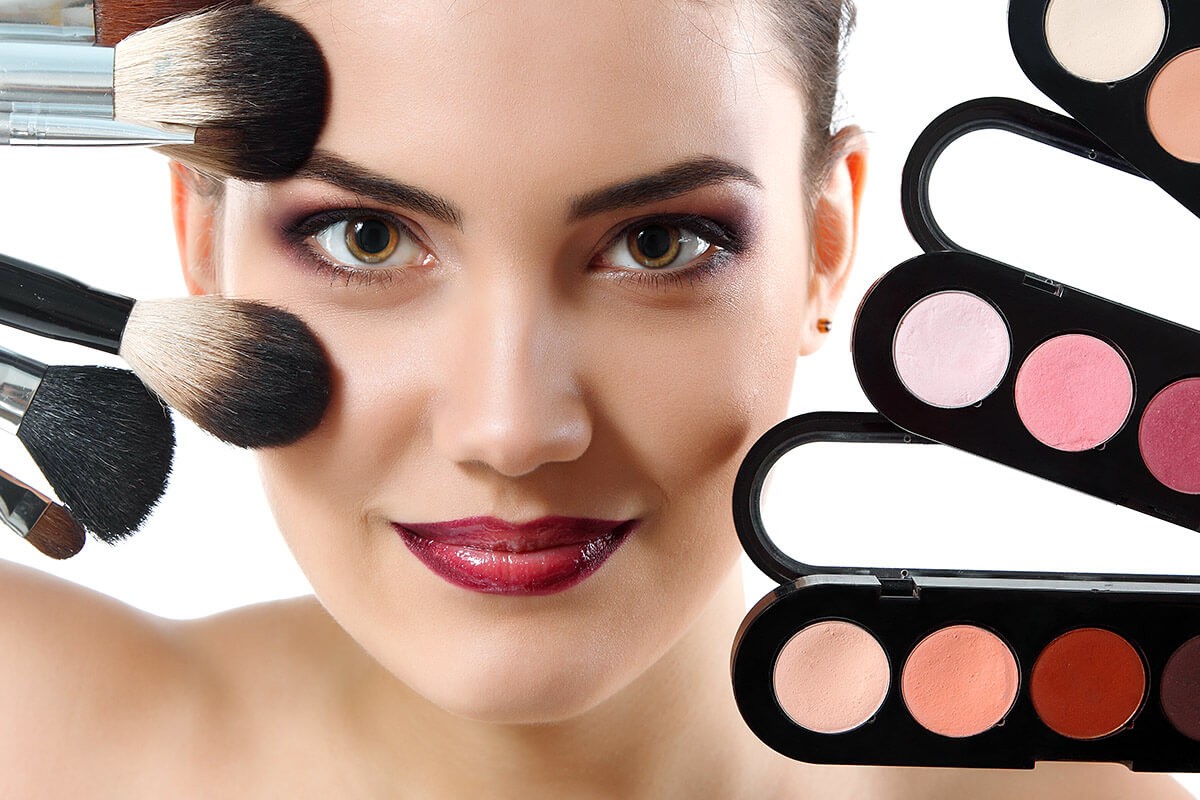 Woman with makeup products