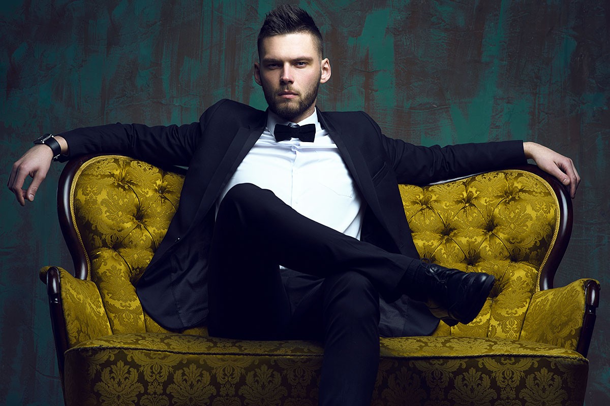 Handsome man sitting in a chair