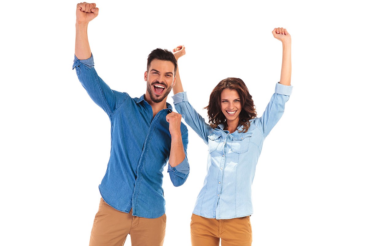 A man and a woman together rejoice in their success