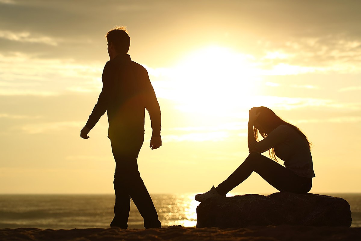 Image of a family crisis - a man leaves his wife Image of a family crisis - a man leaves his wife