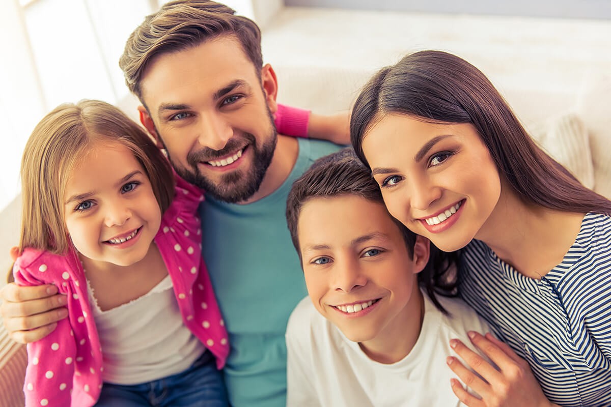 Image of happy children and their parents