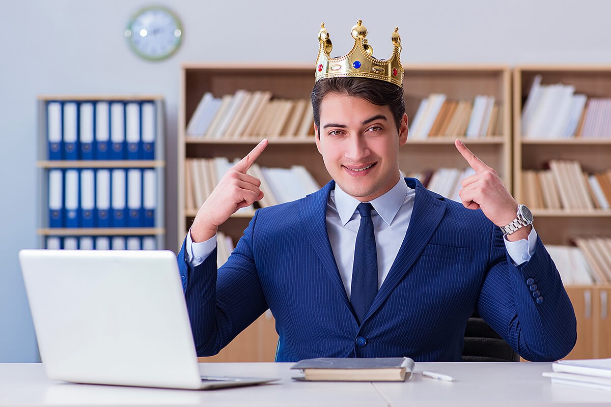 Business man with a crown on his head