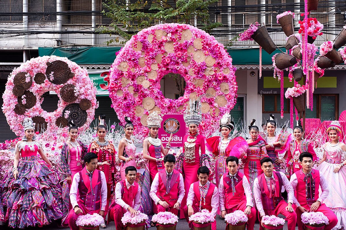 View of men and women at the Annual Flower Parade, Chiang Mai, Thailand