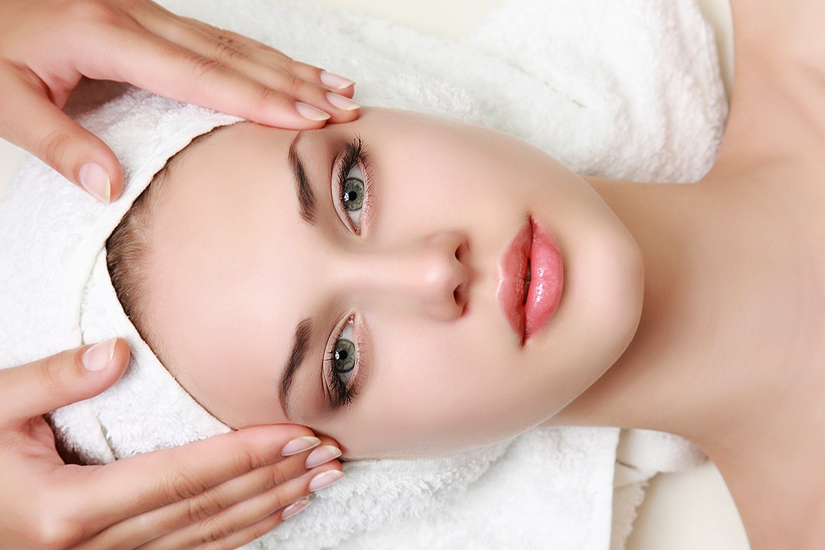 Image of a woman being massaged to rejuvenate her face