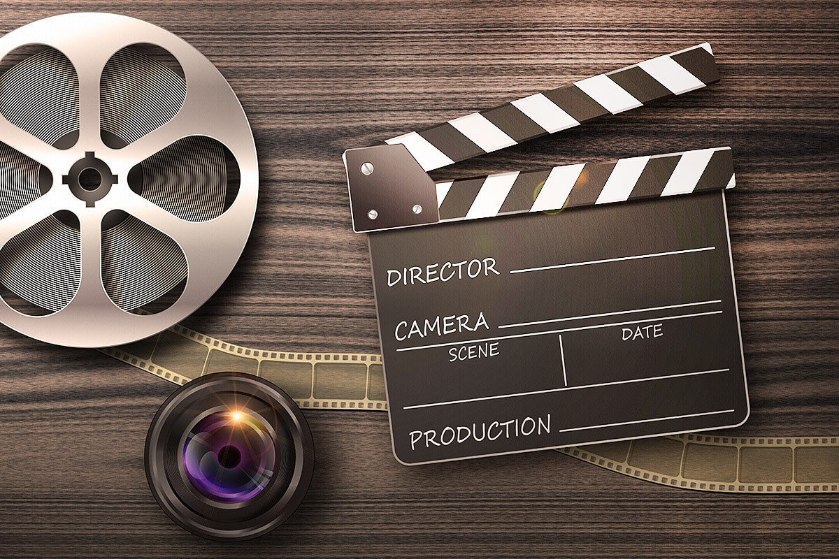 Image of reel with film and clapperboard