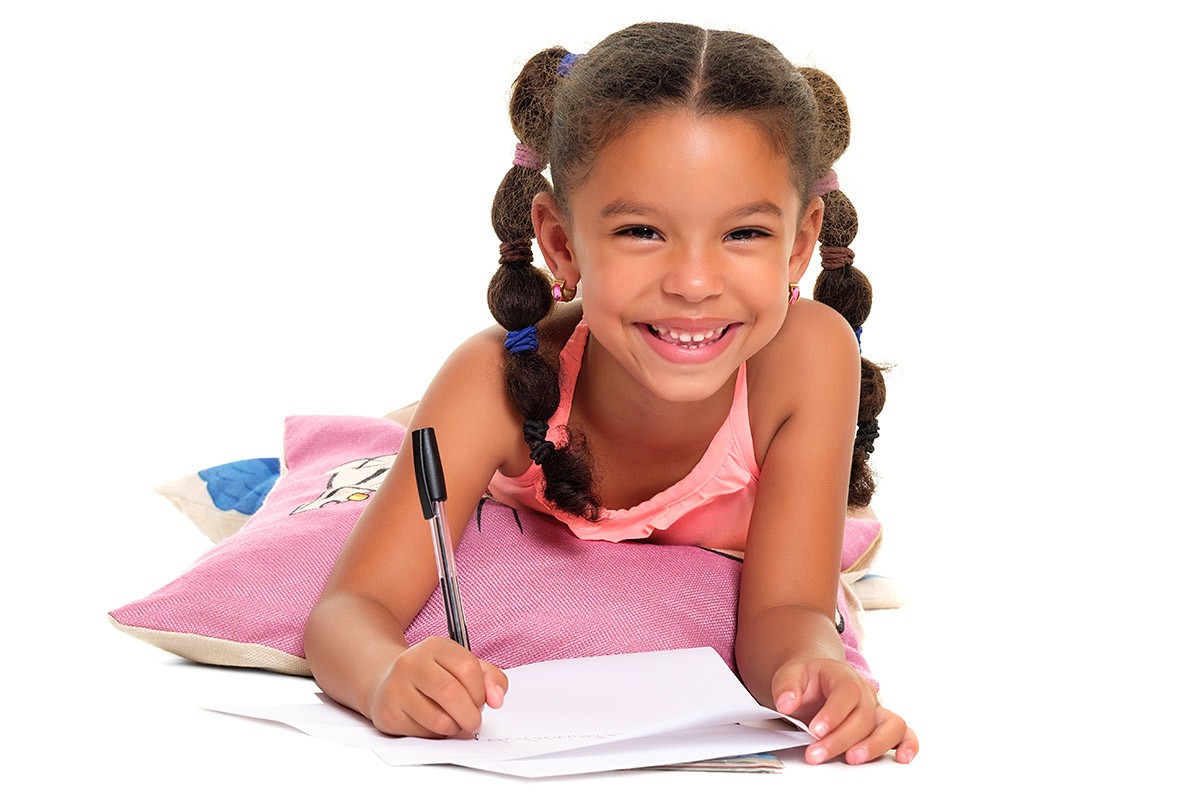 Image of a girl with a notebook and pen