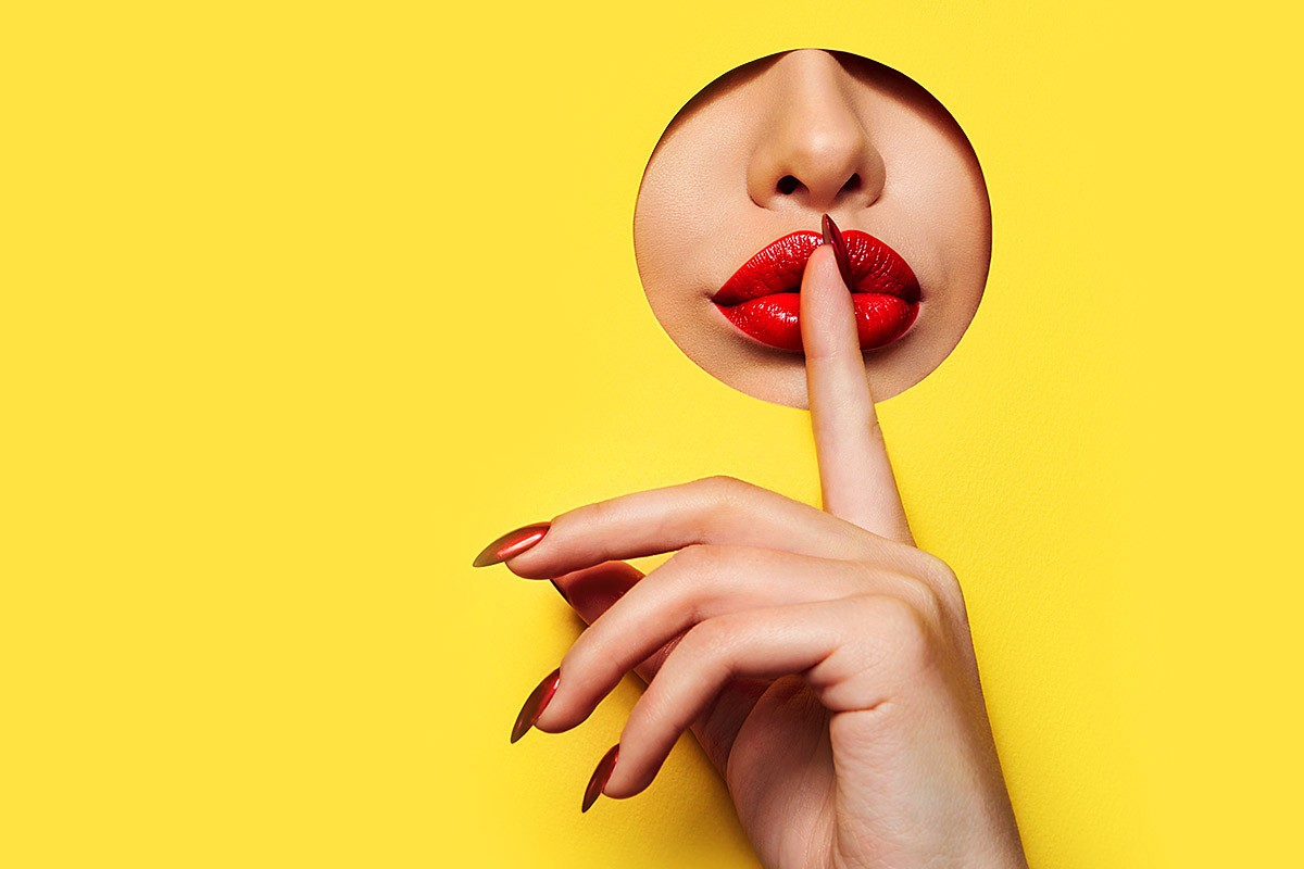Image of a girl who shows speak quietly