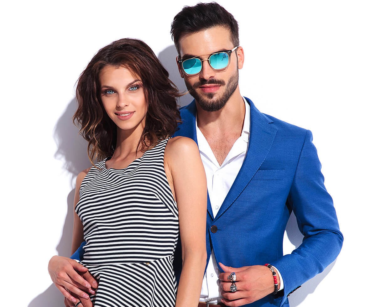 A man with high self-esteem and an attractive woman next to him