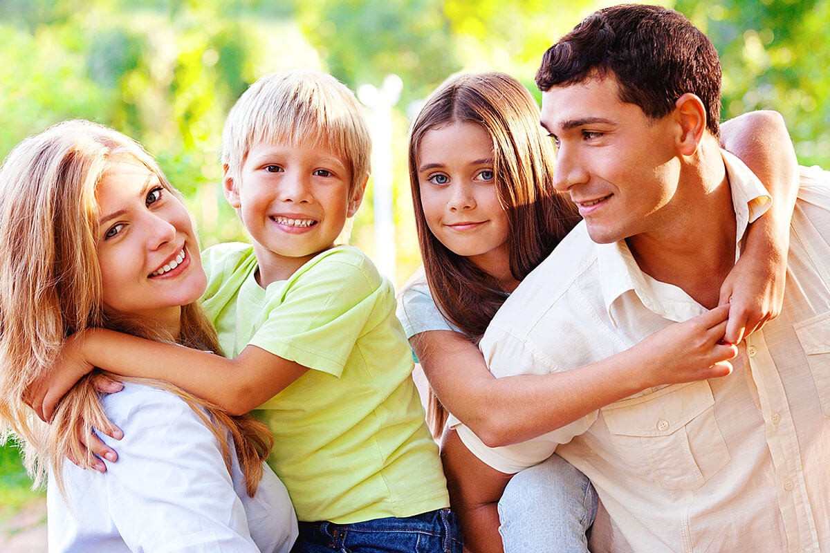 Happy family and their two children