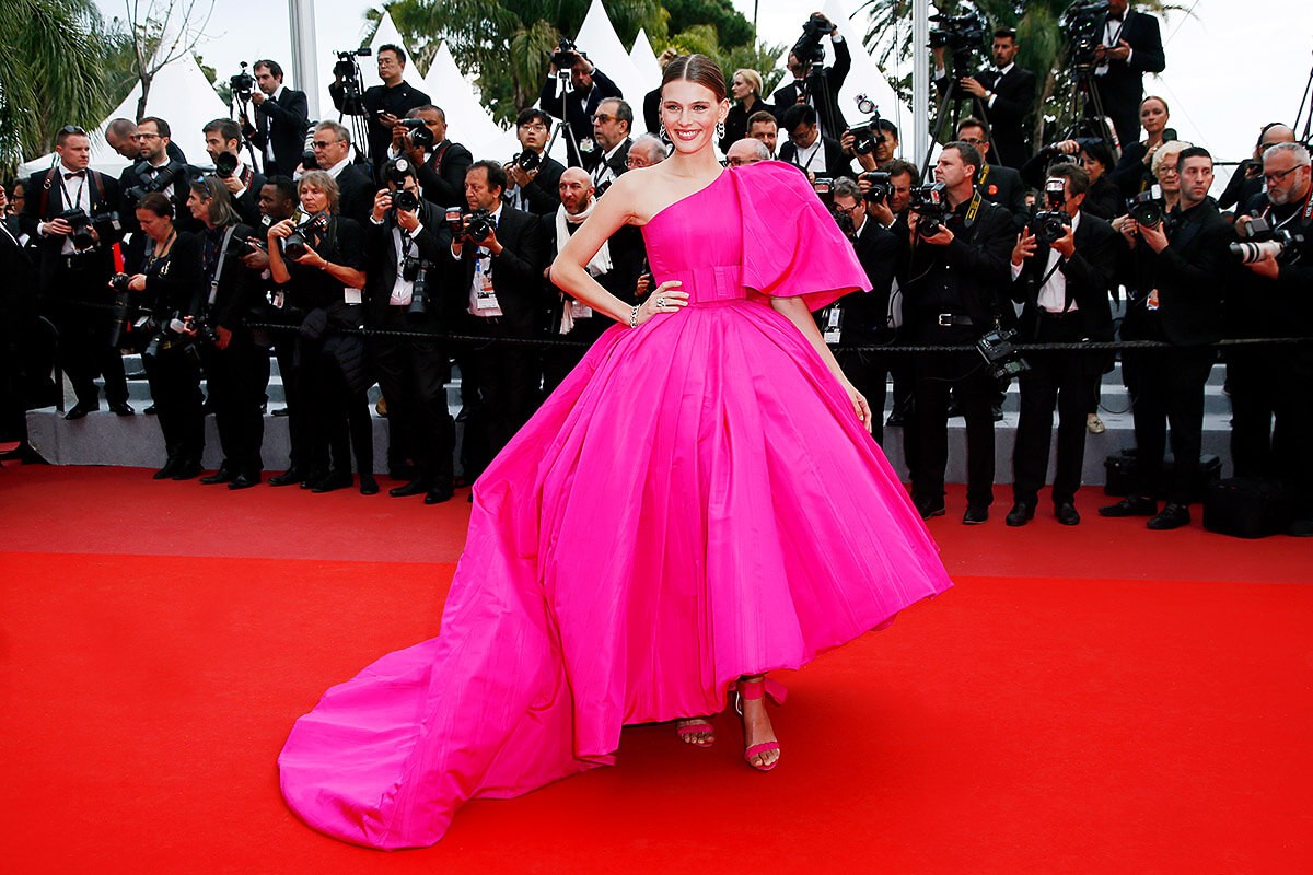 Model Madison Headrick in a pink puffy dress on the red carpet