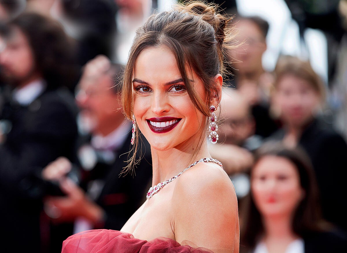 Brazilian fashion model Izabel Goulart pleasantly smiles
