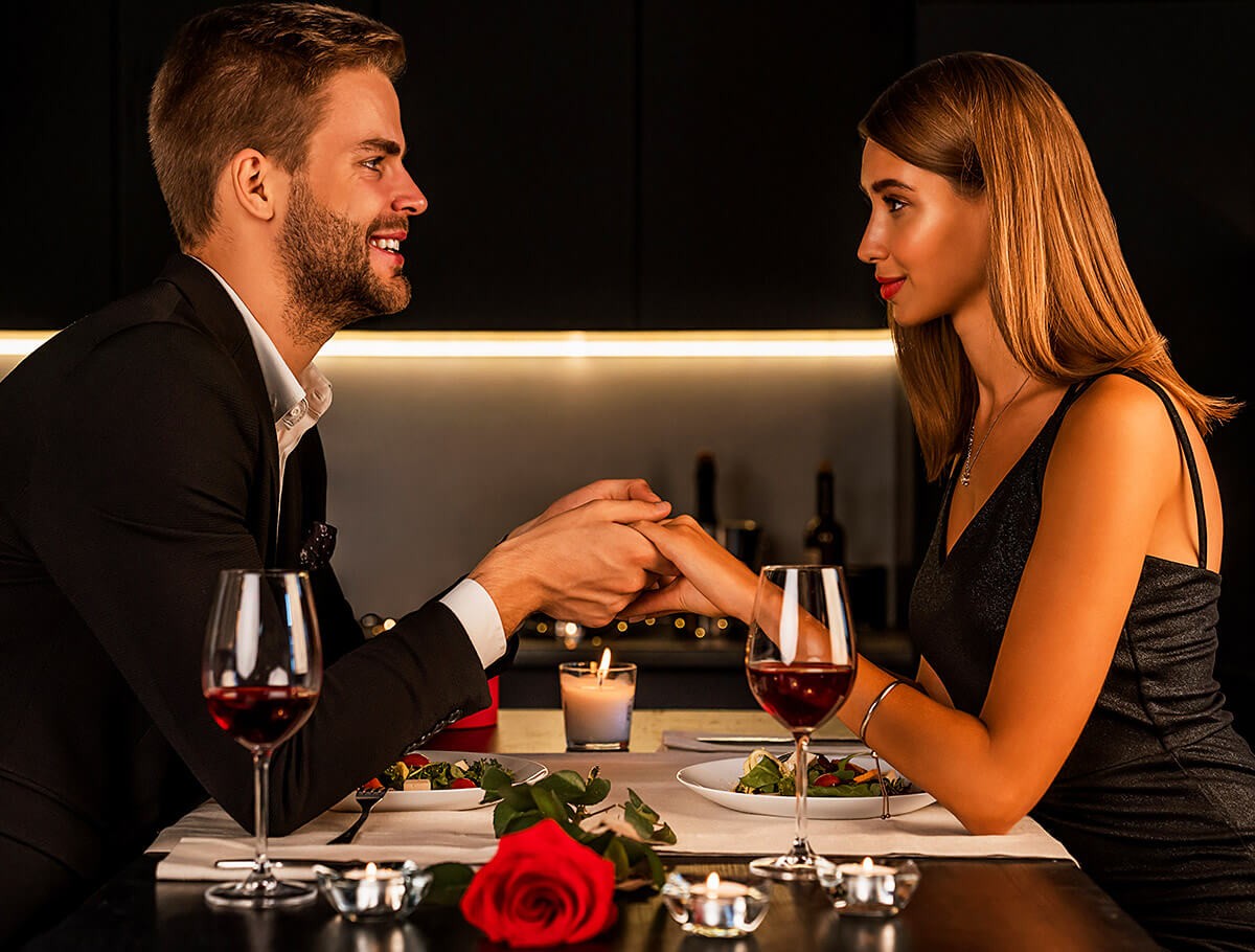 Young man and girl meet in a restaurant