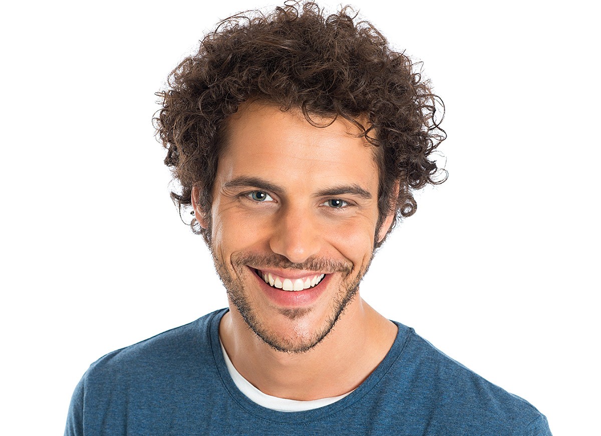 Charismatic young man smiles pleasantly