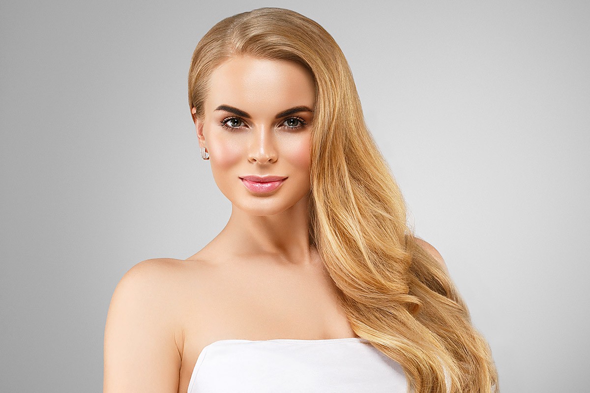 Beautiful woman with well-groomed face skin