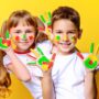 Image of children playing with paint
