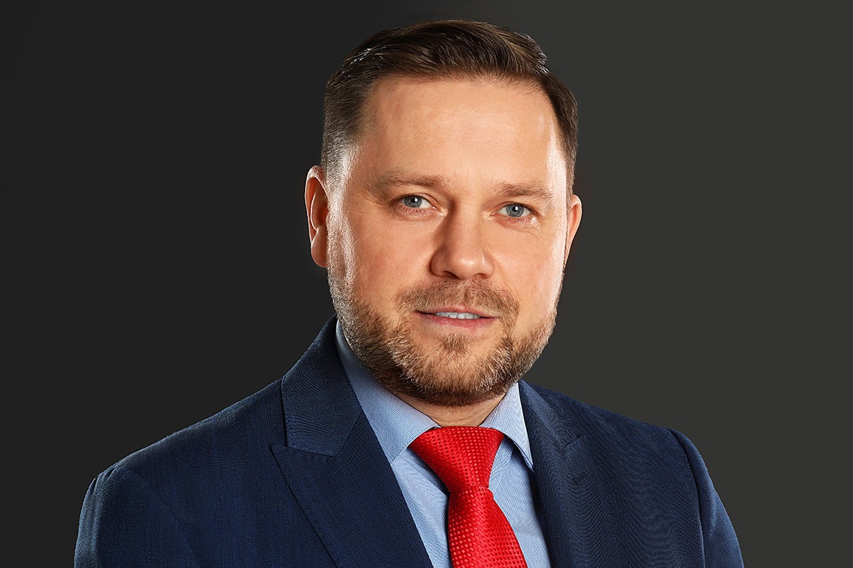 Image of a business man in a red tie