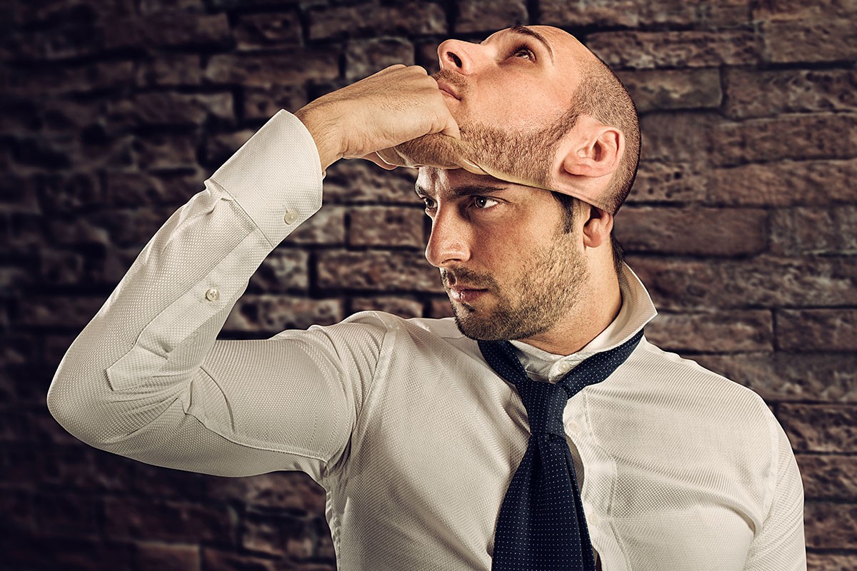 Image of a gigolo man who removes his deceitful mask from his face