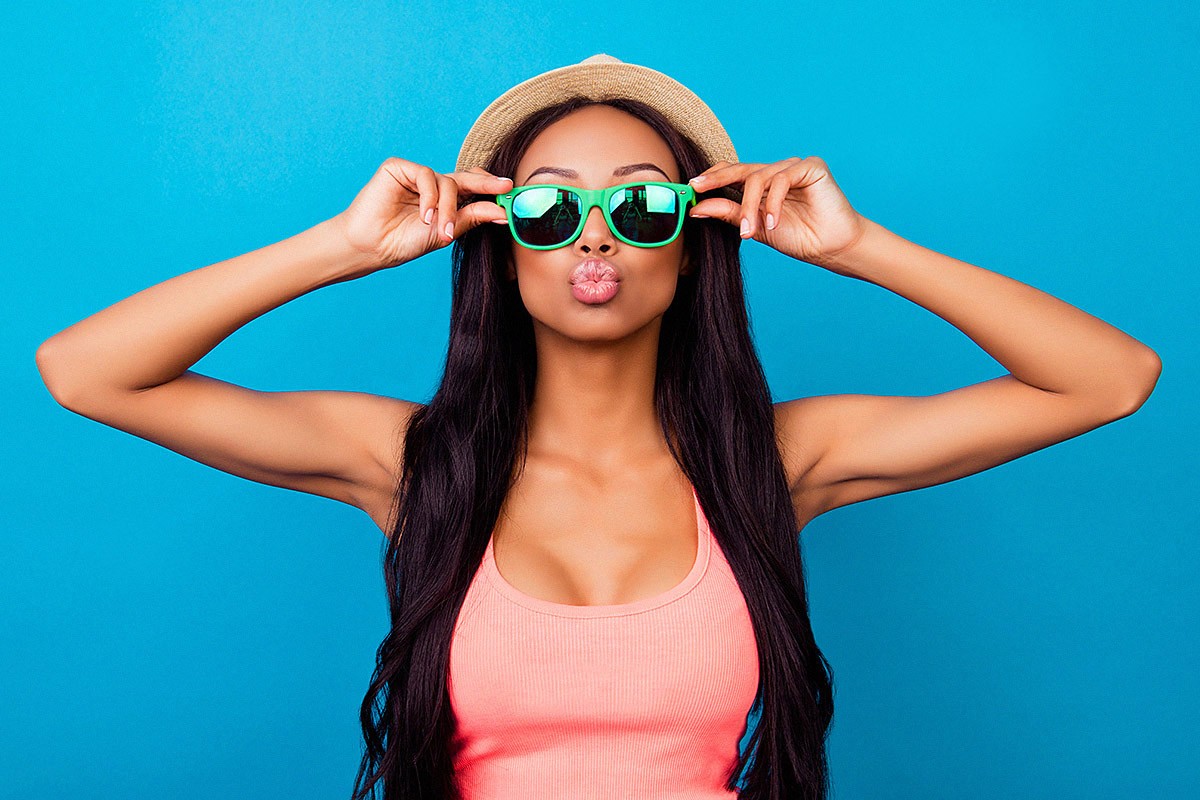 Girl in a hat and glasses with beautiful lips Girl in a hat and glasses with beautiful lips