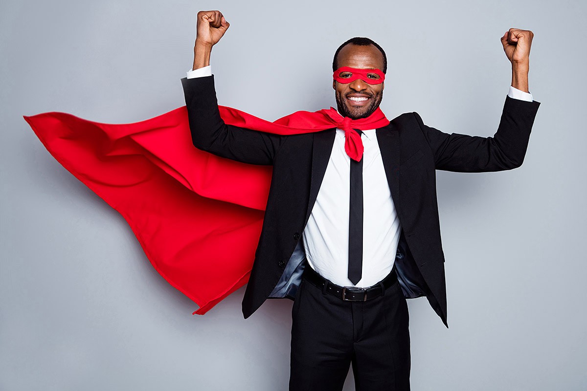 Husband in red superman cape and mask