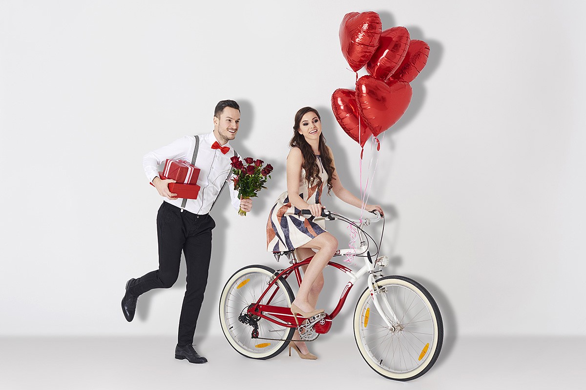 Man enchanted by blind love runs with flowers after a girl