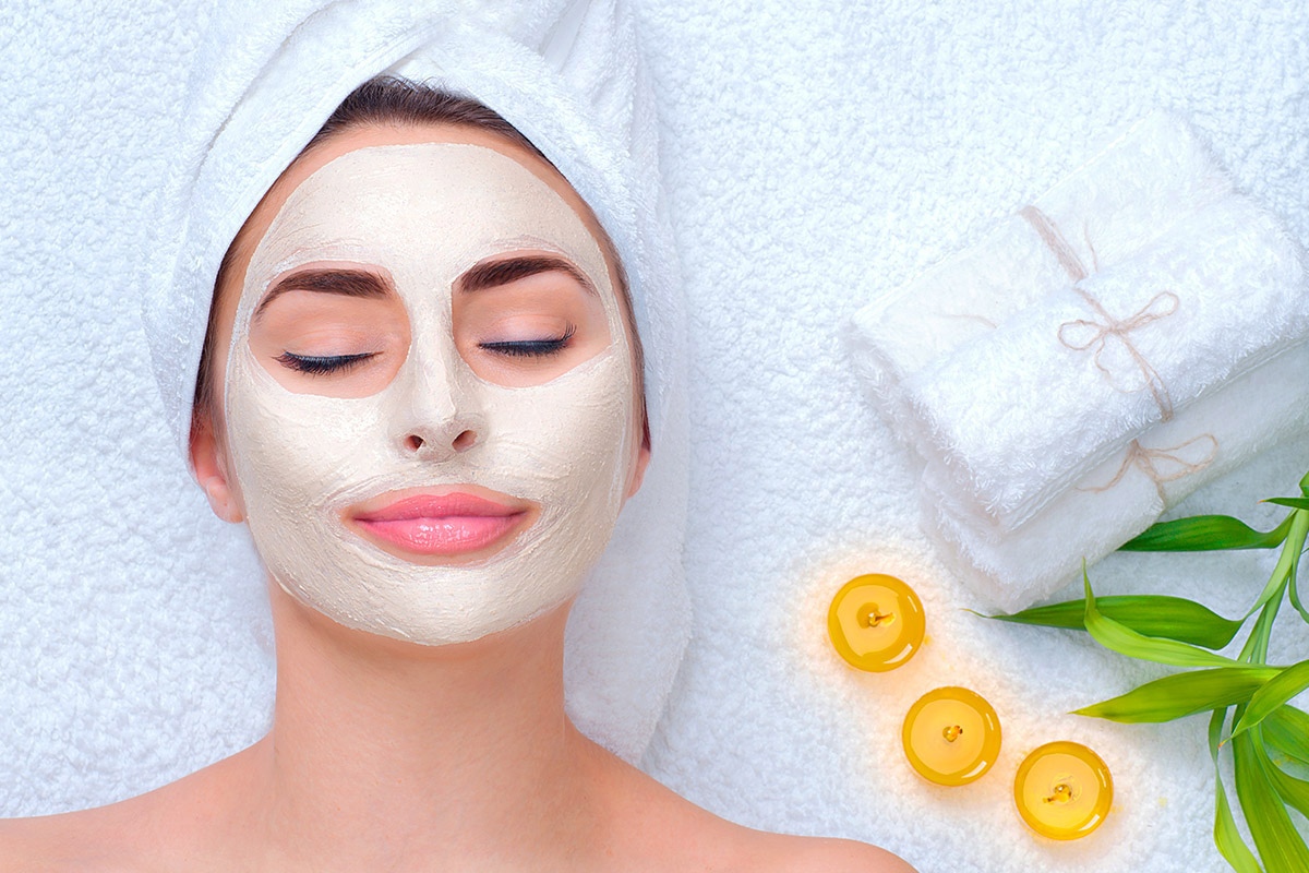 Image of a woman caring for her face