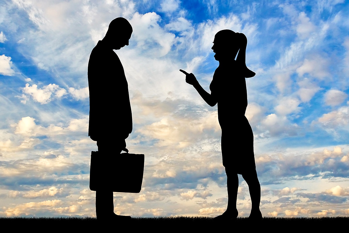 Image of a woman wagging her finger at a man Image of a woman wagging her finger at a man