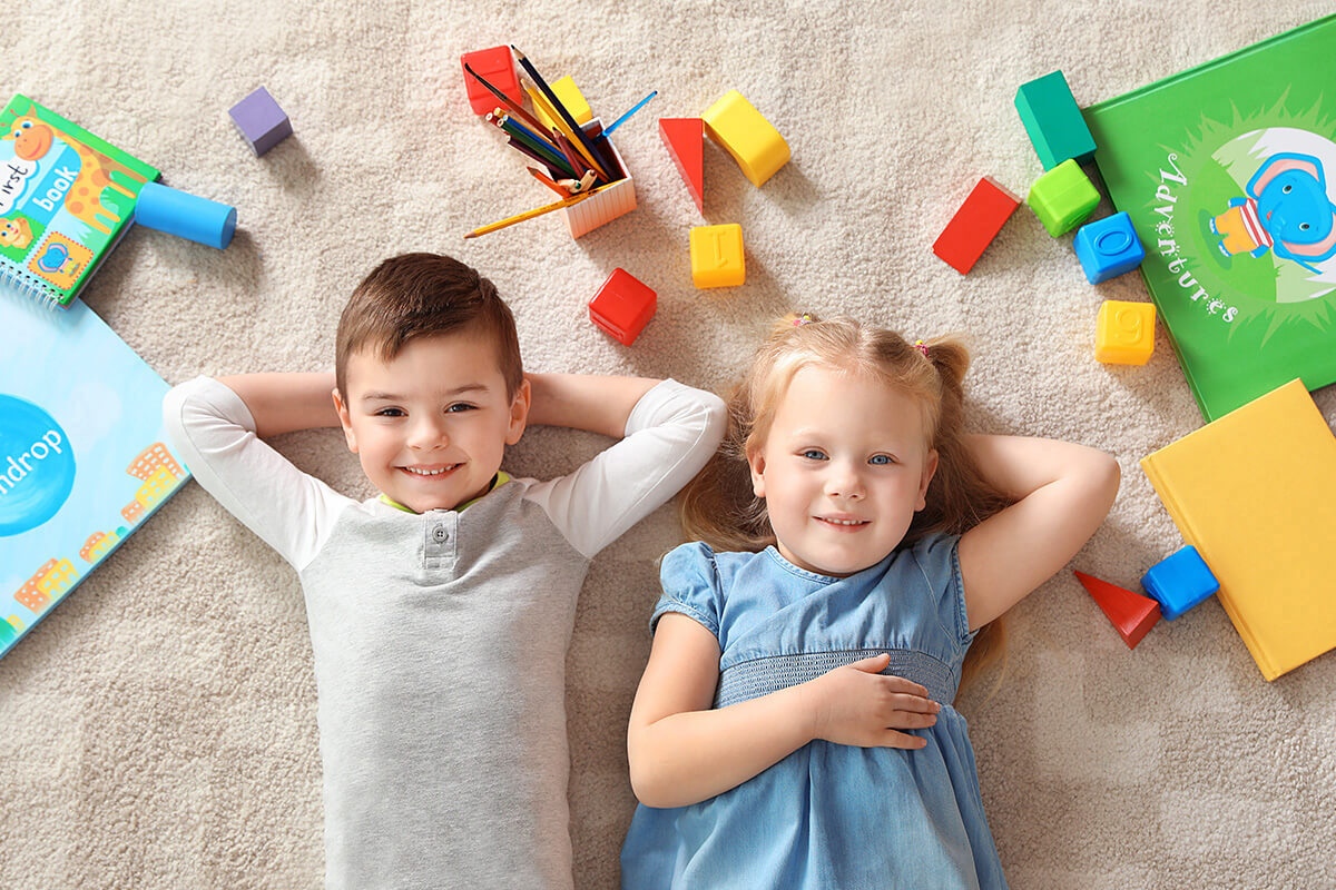 Image of happy children with toys
