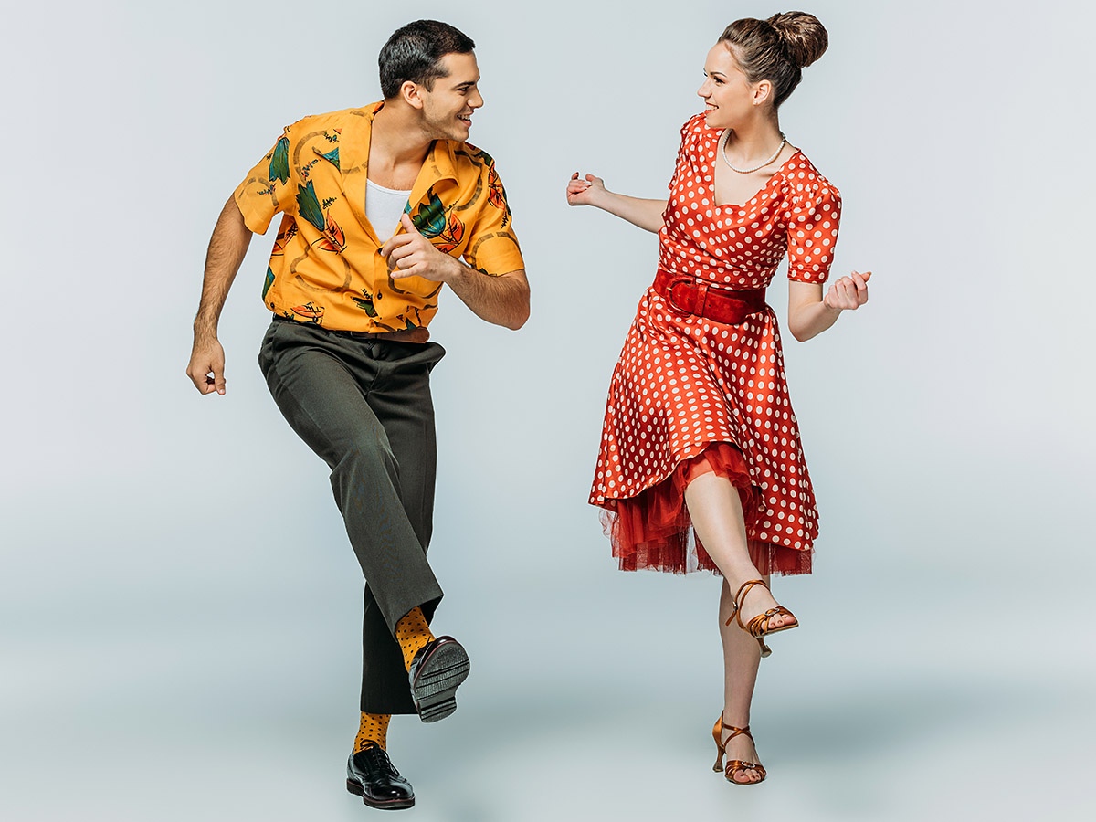 Joyful couple dancing fun