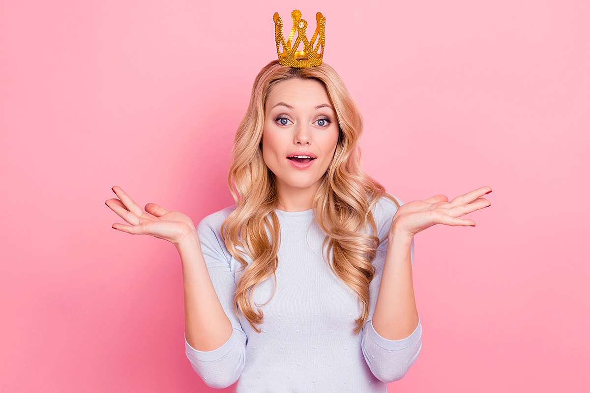 Image of a joyful woman with a crown on her head