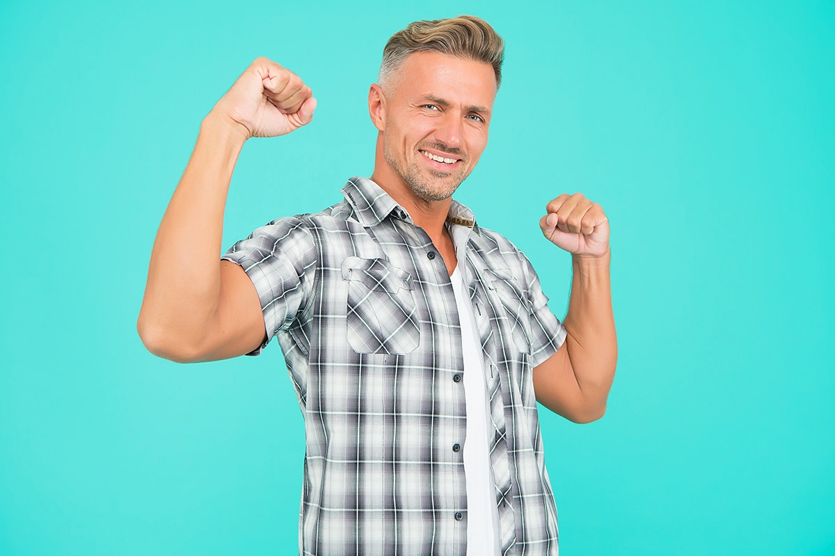 Image of a charming man with a smile on his face