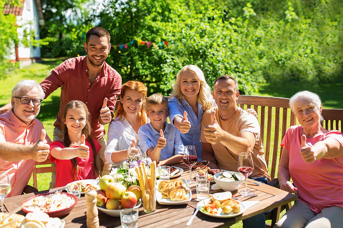 Image of a large and happy family in nature