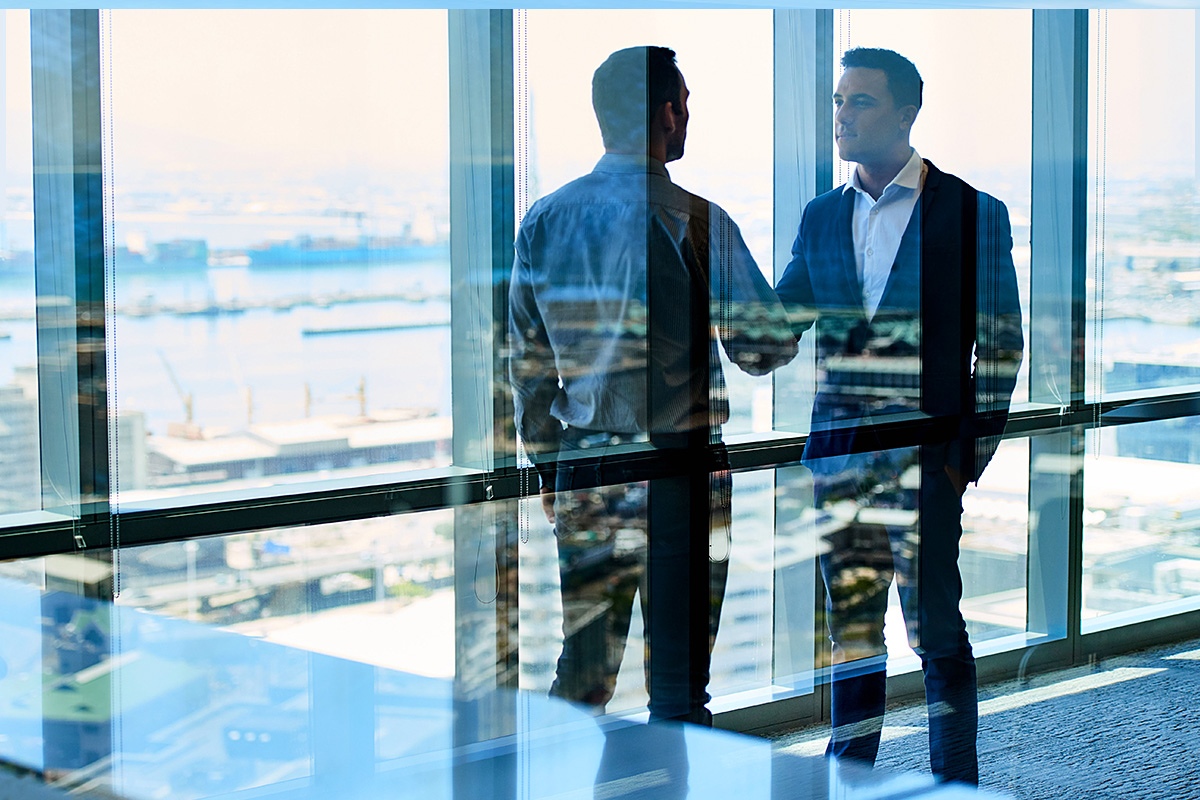 Handshake of two business people