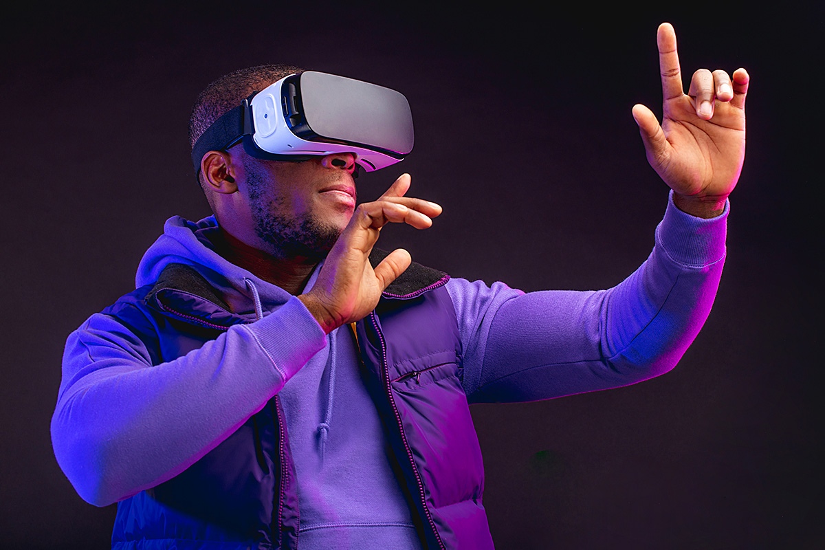 Image of a man wearing virtual reality glasses