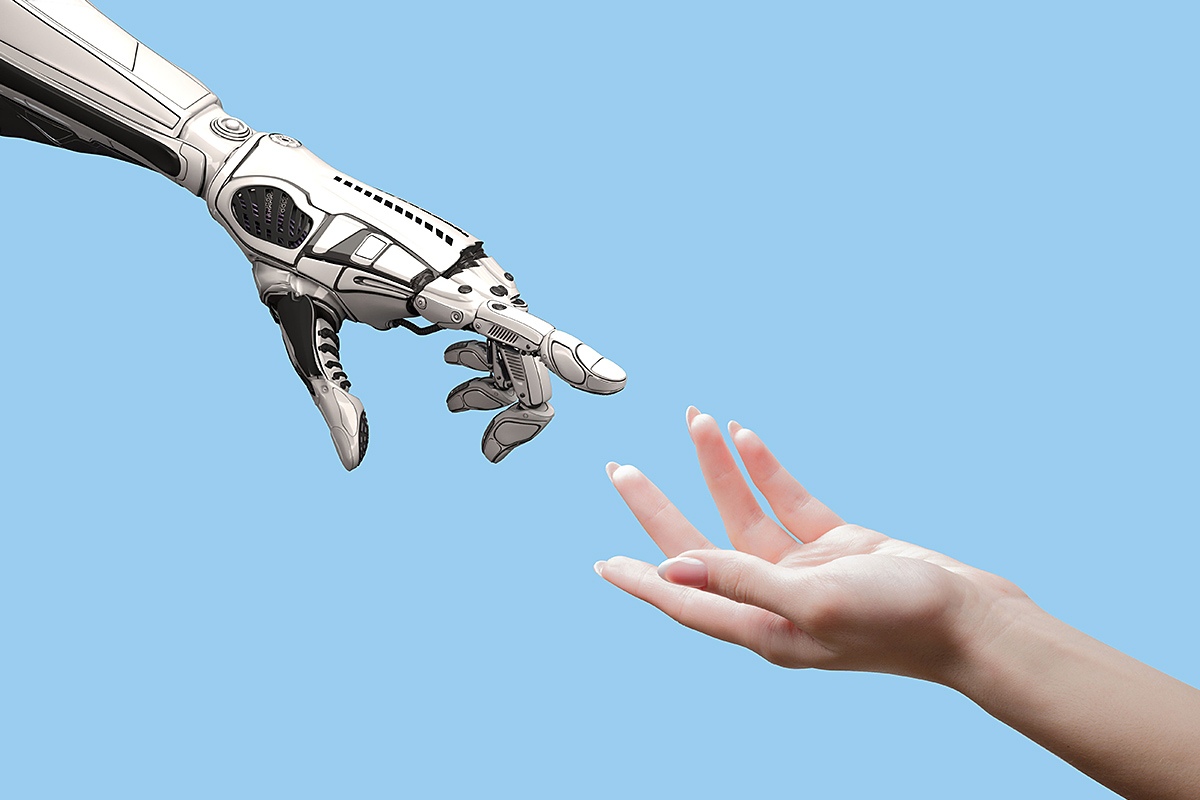 Image of a robot hand and a human